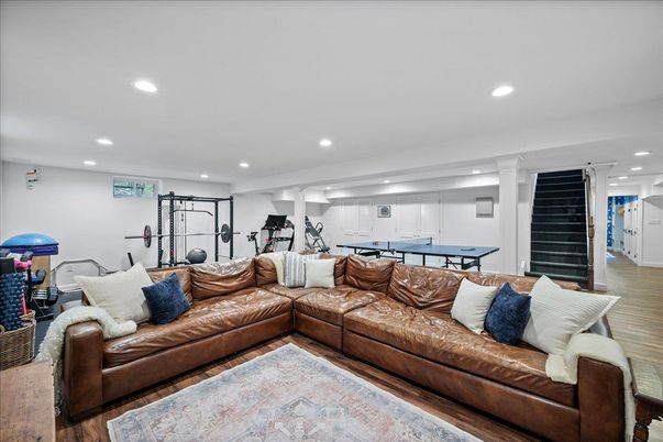 Billiard Table, Fitness Equipment, Game Room, Interior, Living room, Recessed Lighting, Wood Texture Flooring