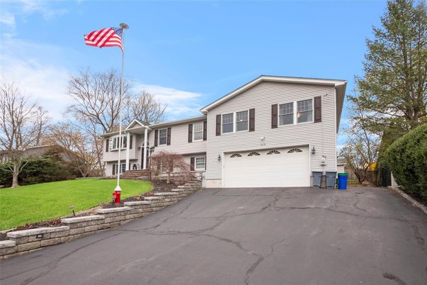 Attached, Exterior, Facade, Raised Ranch