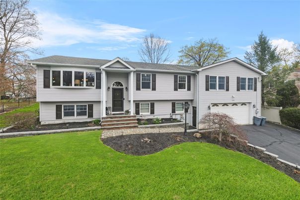 Attached, Exterior, Facade, Raised Ranch