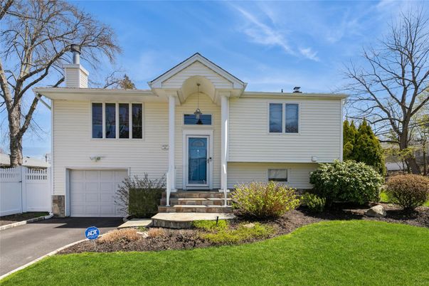 Attached, Exterior, Facade, Raised Ranch