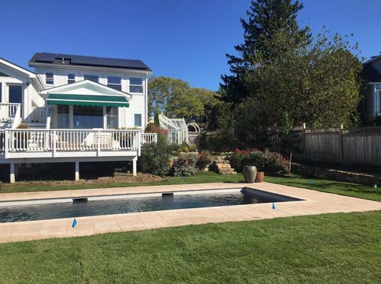 Exterior, Pool, Solar Panels