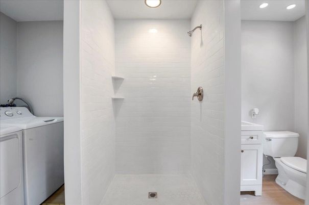 Bathroom, Interior, Recessed Lighting, Washer, Wood Texture Flooring