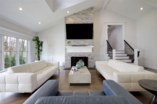 Fireplace, Interior, Living room, Recessed Lighting, Stone Walls, Wood Texture Flooring