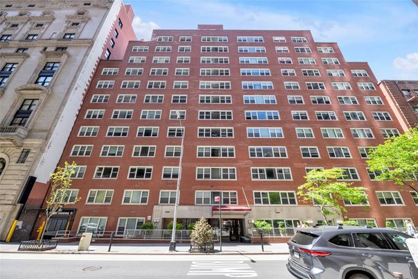 Exterior, Facade, Brick Facade, Condo Building