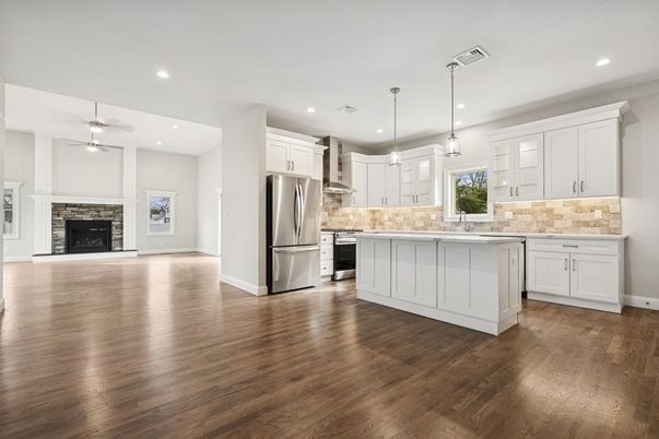 Fireplace, Interior, Kitchen, Pendant Lights, Recessed Lighting, Stainless Steel Appliances, Wood Texture Flooring