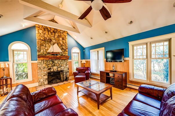 Fireplace, Interior, Living room, Recessed Lighting, Stone Walls, Wooden Beams, Wood Texture Flooring