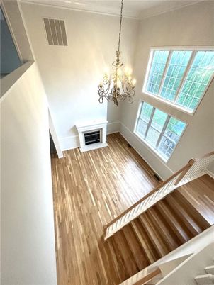 Chandelier, Fireplace, Interior, Wood Texture Flooring