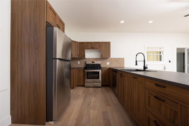 Interior, Kitchen, Recessed Lighting, Stainless Steel Appliances, Wood Texture Flooring