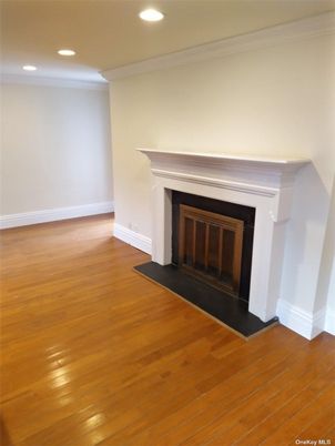 Empty room, Fireplace, Interior, Recessed Lighting, Wood Texture Flooring