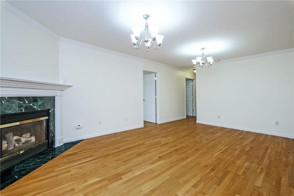 Chandelier, Empty room, Fireplace, Interior, Wood Texture Flooring