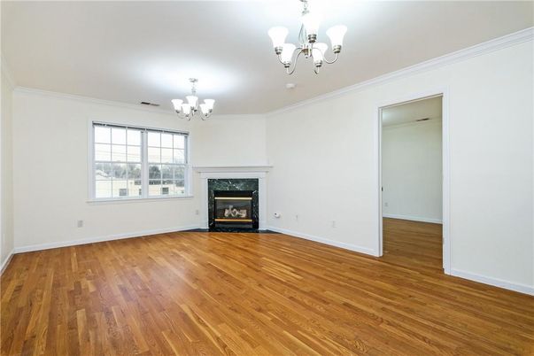 Chandelier, Empty room, Fireplace, Interior, Wood Texture Flooring
