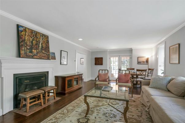 Dining room, Fireplace, Interior, Living room, Recessed Lighting, Wood Texture Flooring