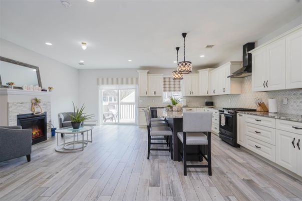 Fireplace, Interior, Kitchen, Pendant Lights, Recessed Lighting, Wood Texture Flooring