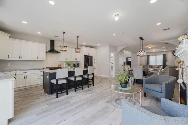 Dining room, Interior, Kitchen, Living room, Pendant Lights, Recessed Lighting, Stainless Steel Appliances, Wood Texture Flooring