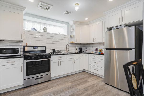 Interior, Kitchen, Recessed Lighting, Stainless Steel Appliances, Wood Texture Flooring
