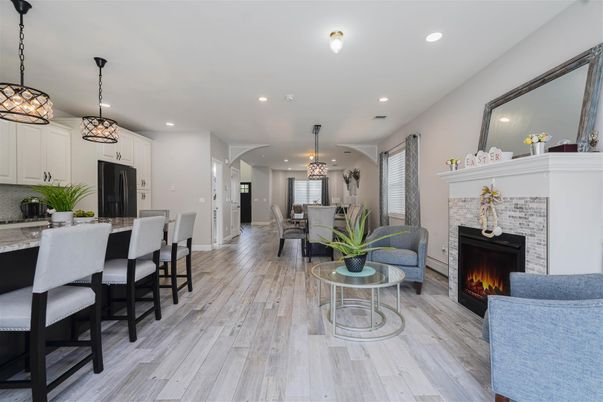 Chandelier, Dining room, Fireplace, Interior, Kitchen, Living room, Pendant Lights, Recessed Lighting, Wood Texture Flooring