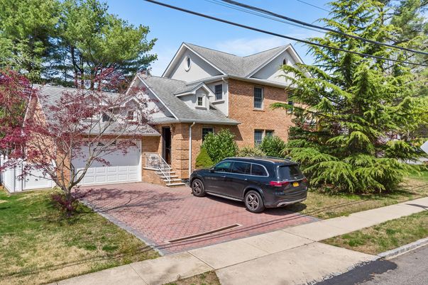 Attached, Exterior, Facade, Brick Facade, Tudor Revival