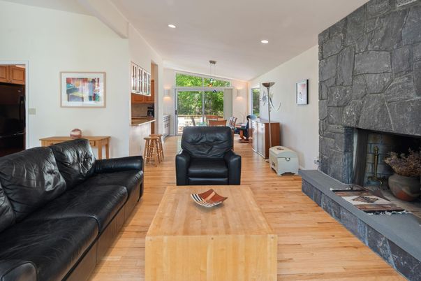 Dining room, Fireplace, Interior, Living room, Pendant Lights, Recessed Lighting, Stone Walls, Wood Texture Flooring