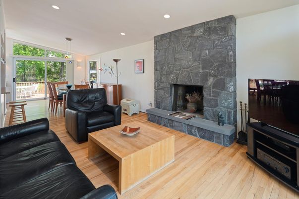 Dining room, Fireplace, Interior, Living room, Pendant Lights, Recessed Lighting, Wood Texture Flooring