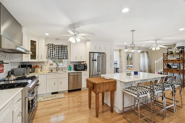 Interior, Kitchen, Pendant Lights, Recessed Lighting, Stainless Steel Appliances, Wood Texture Flooring