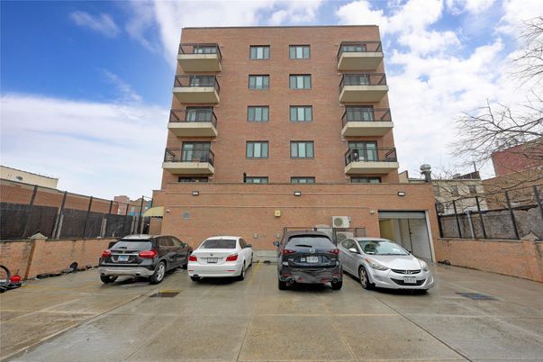 Exterior, Facade, Brick Facade, Condo Building