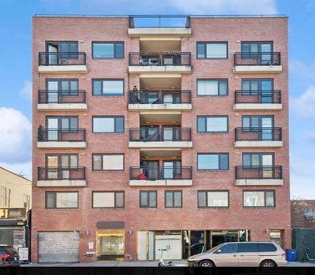 Exterior, Facade, Brick Facade, Condo Building