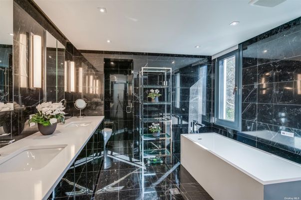 Bathroom, Dual Sink Vanities, Free Standing Baths, Glass Shower, Interior, Marble, Marble Walls, Recessed Lighting