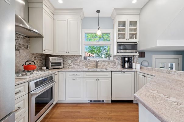 Interior, Kitchen, Pendant Lights, Recessed Lighting, Stainless Steel Appliances, Wood Texture Flooring