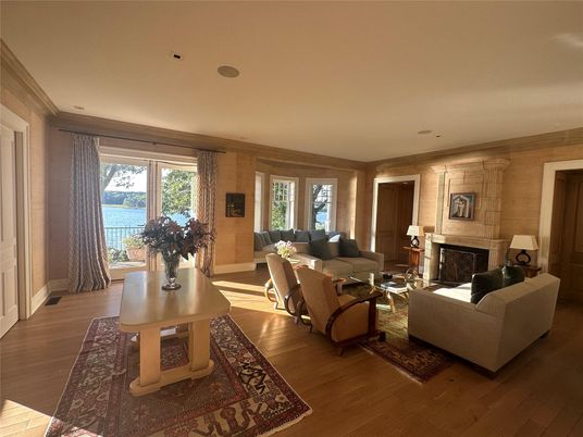 Fireplace, Interior, Living room, Recessed Lighting, Water, Wood Texture Flooring, Wooden Walls