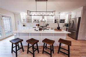 Interior, Kitchen, Pendant Lights, Stainless Steel Appliances, Wood Texture Flooring