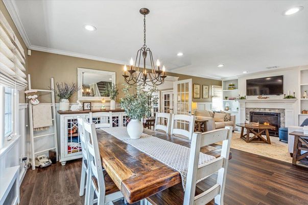 Chandelier, Dining room, Fireplace, Interior, Living room, Recessed Lighting, Wood Texture Flooring