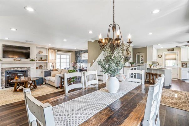 Chandelier, Dining room, Fireplace, Interior, Kitchen, Living room, Recessed Lighting, Wood Texture Flooring