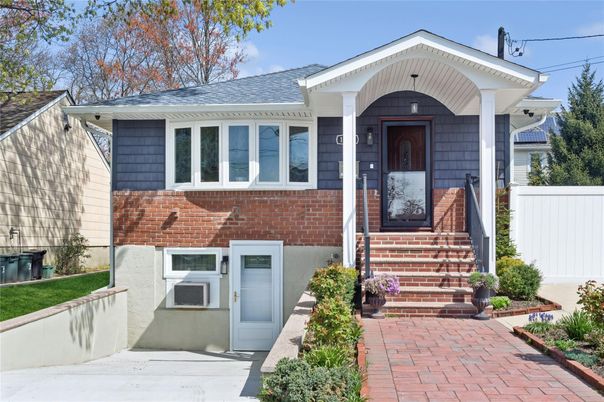 Exterior, Facade, Brick Facade, Raised Ranch