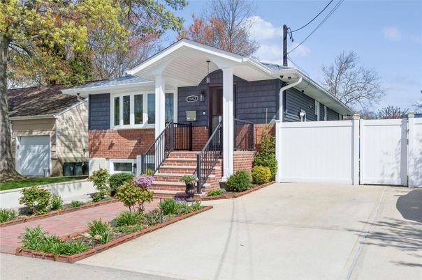 Exterior, Facade, Brick Facade, Raised Ranch
