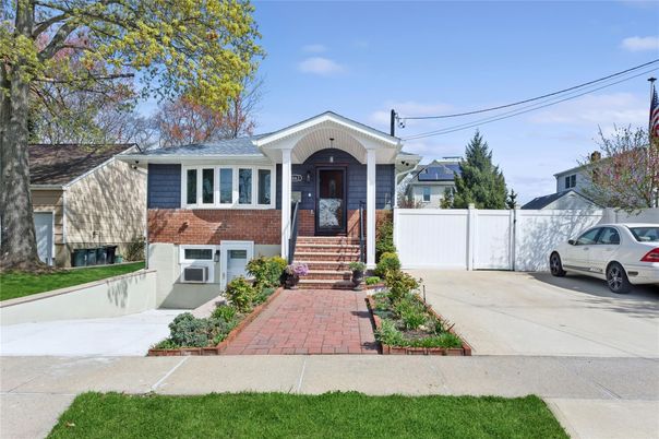 Exterior, Facade, Brick Facade, Raised Ranch