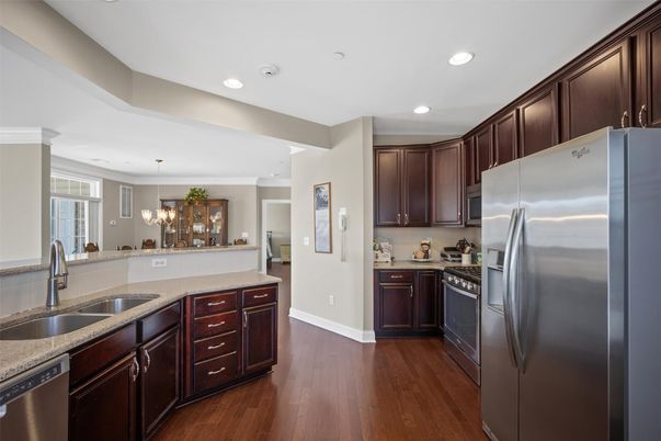 Chandelier, Dining room, Interior, Kitchen, Pendant Lights, Recessed Lighting, Stainless Steel Appliances, Wood Texture Flooring