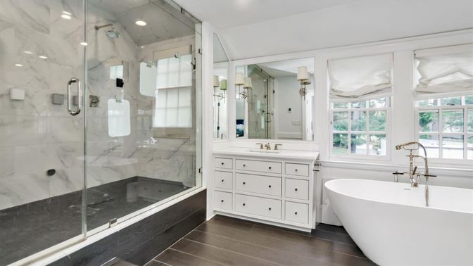Bathroom, Free Standing Baths, Glass Shower, Interior, Marble Walls, Recessed Lighting, Wood Texture Flooring
