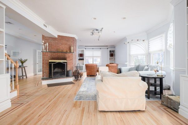 Fireplace, Interior, Living room, Recessed Lighting, Stone Walls, Wood Texture Flooring