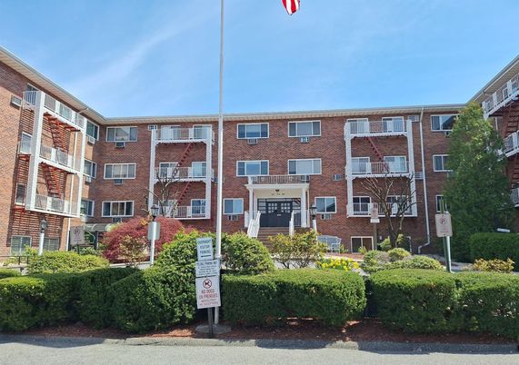 Exterior, Facade, Brick Facade, Condo Building