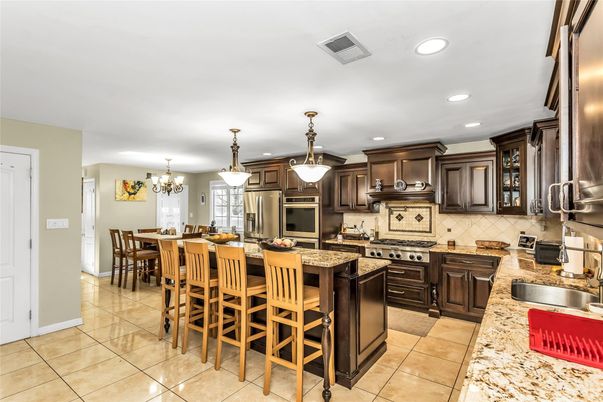 Chandelier, Dining room, Interior, Kitchen, Pendant Lights, Recessed Lighting, Stainless Steel Appliances