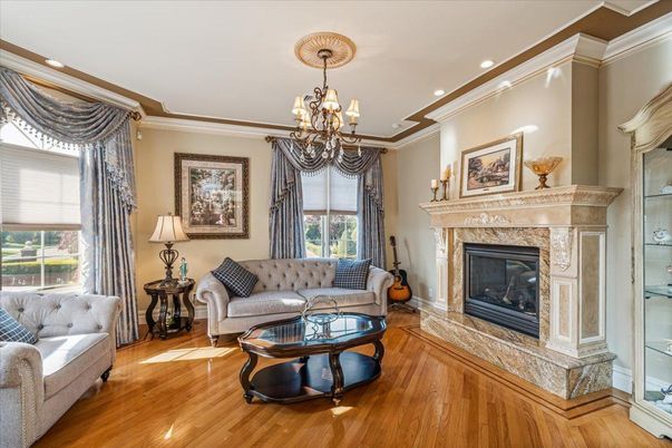 Chandelier, Fireplace, Interior, Living room, Recessed Lighting, Wood Texture Flooring