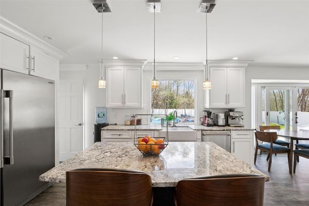 Dining room, Interior, Kitchen, Pendant Lights, Recessed Lighting, Stainless Steel Appliances, Wood Texture Flooring