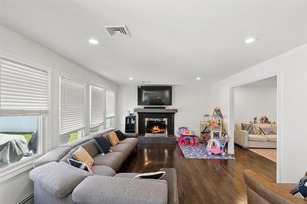 Fireplace, Interior, Living room, Recessed Lighting, Wood Texture Flooring