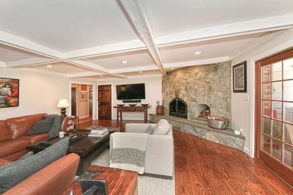Fireplace, Interior, Living room, Recessed Lighting, Stone Walls, Wood Texture Flooring