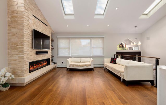 Fireplace, Interior, Living room, Pendant Lights, Recessed Lighting, Stone Walls, Wood Texture Flooring