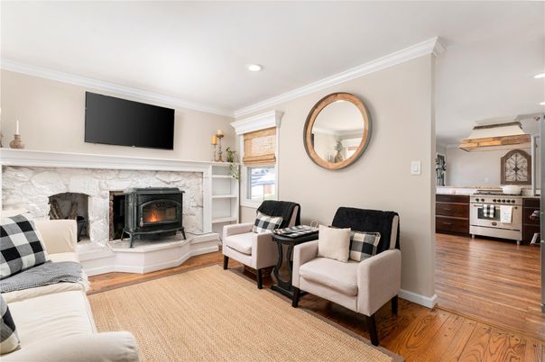 Fireplace, Interior, Living room, Recessed Lighting, Wood Texture Flooring