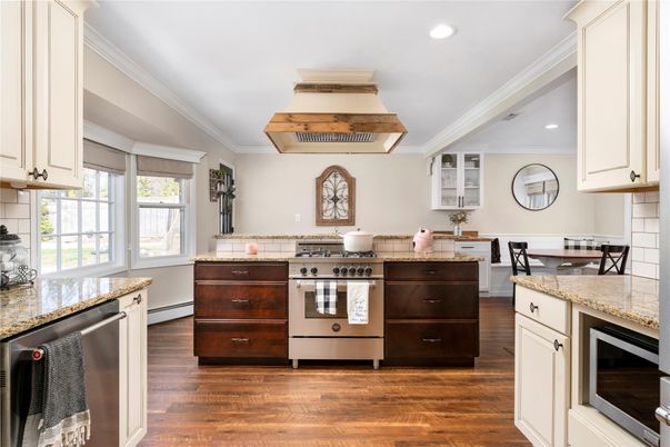 Dining room, Interior, Kitchen, Recessed Lighting, Stainless Steel Appliances, Wood Texture Flooring