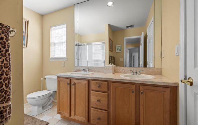 Bathroom, Dual Sink Vanities, Interior, Recessed Lighting, Tile Countertops