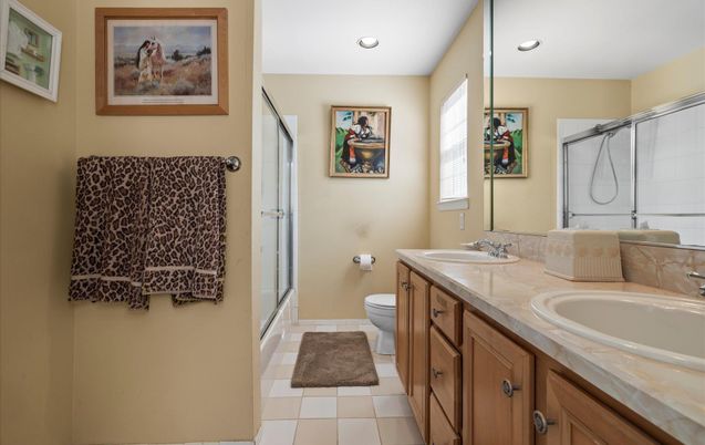 Bathroom, Dual Sink Vanities, Interior, Recessed Lighting, Tile Countertops