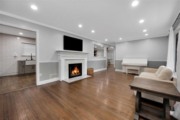 Fireplace, Interior, Piano, Recessed Lighting, Wood Texture Flooring